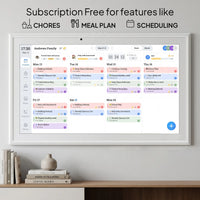 A white smart display screen mounted on a wall above a shelf with books and a small vase. The screen shows a digital planner interface with chores, meal plan, and scheduling tasks.